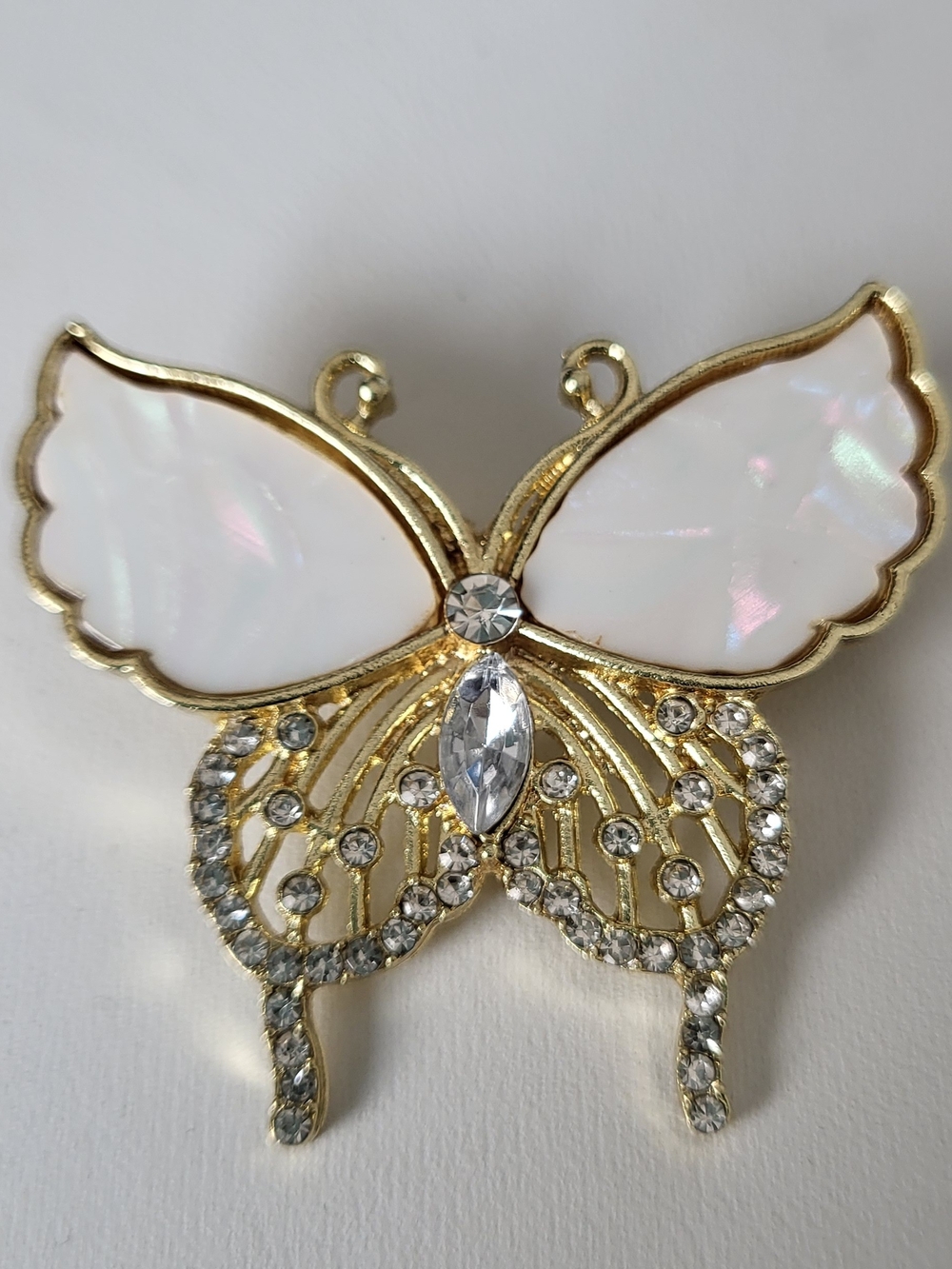 Goldtone Butterfly Brooch with White Faux Enamel and Clear Crystals